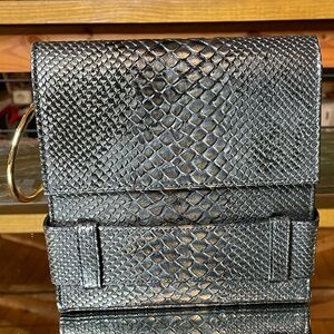 Rare Yves St. Laurent snake embossed bracelet handle bag